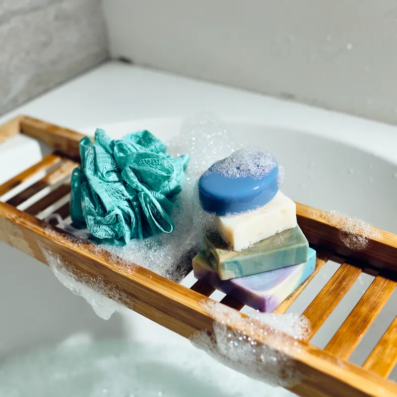 Stack of handmade bars on a bath tray