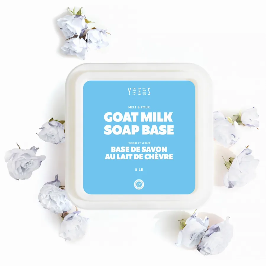 Goat milk soap base tub from above, with white roses