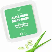 Aloe vera soap base tub with fresh aloe leaves