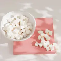 Three butters soap base cut into cubes