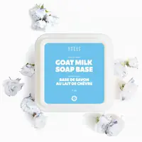 Goat milk soap base tub from above, with white roses