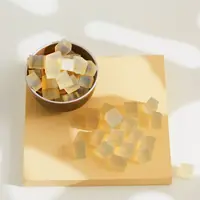 Honey soap base cut into golden cubes