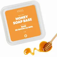 Honey soap base tub with a honey dipper
