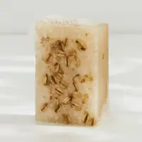 Handmade oatmeal bar with whole oats on top