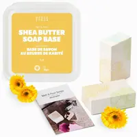 Shea butter soap base tub with boxed bars and the recipe book